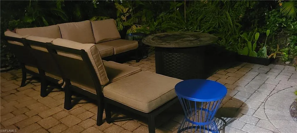 View of patio featuring an outdoor hangout area