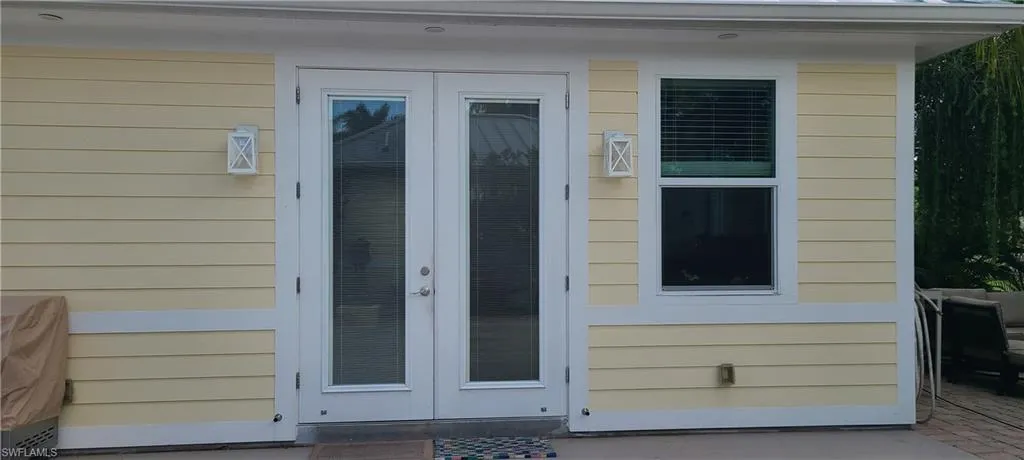 Doorway to coach house with french doors