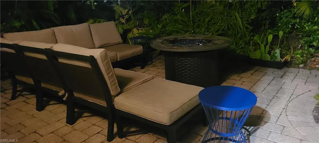 View of patio with an outdoor living space