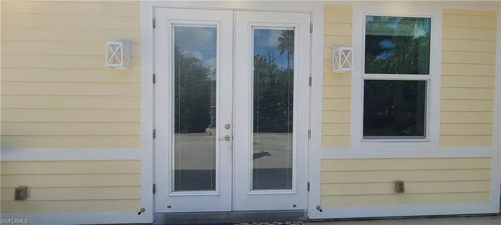 View of exterior entry with French doors
