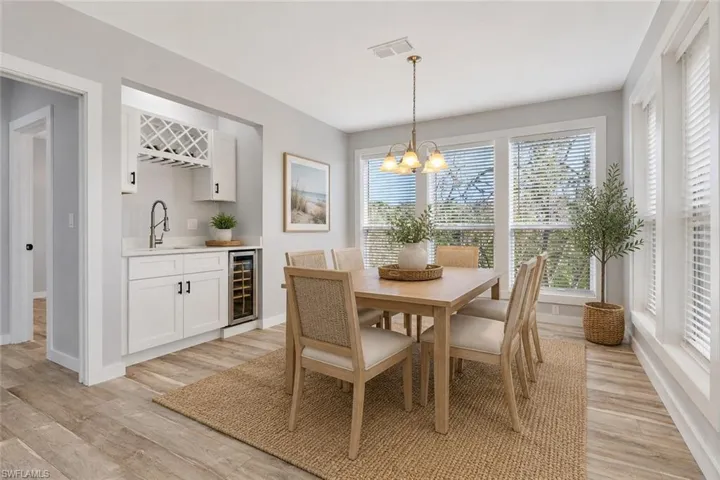 Virtual staging added to illustrate room potential.