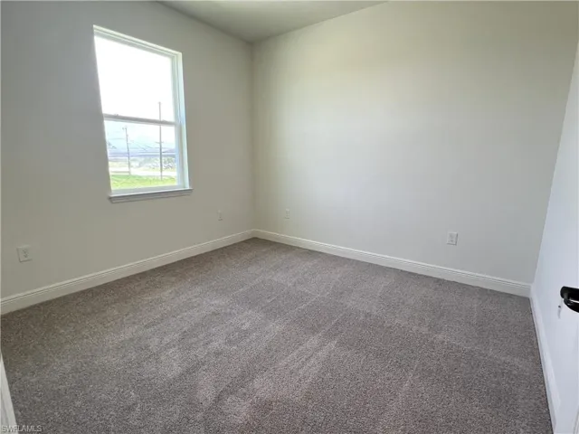 Empty room featuring carpet