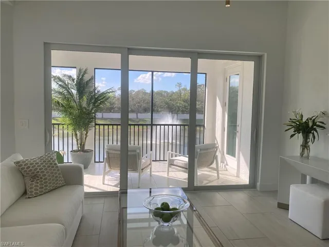 Slider To Outside Area With Fountain and Lake