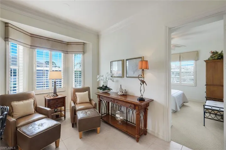 Bay window with multiple windows and plantation shutters