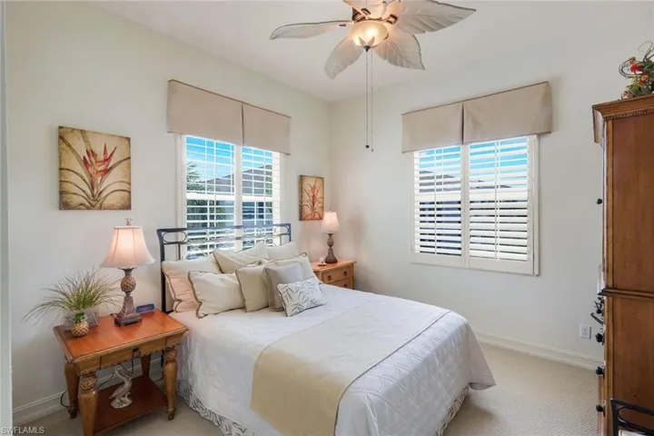 White plantation shutters with valance window treatments