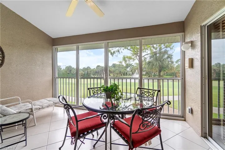 Sunroom with plenty of natural light, ceiling fan, and lofted ceiling