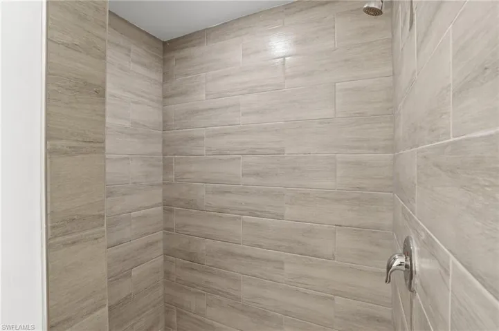Bathroom view of tiled shower