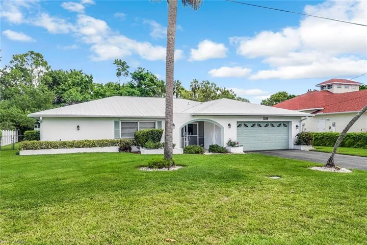 539 Cypress Way E, Naples, Florida 34110