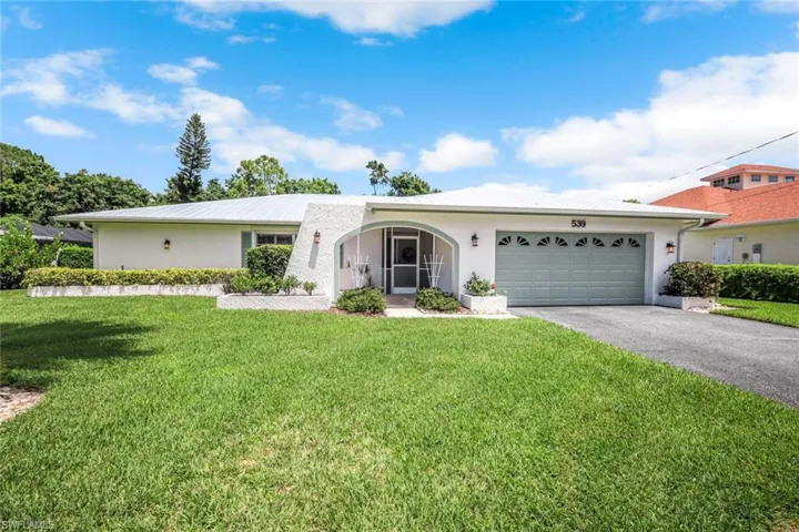 539 Cypress Way E, Naples, Florida 34110