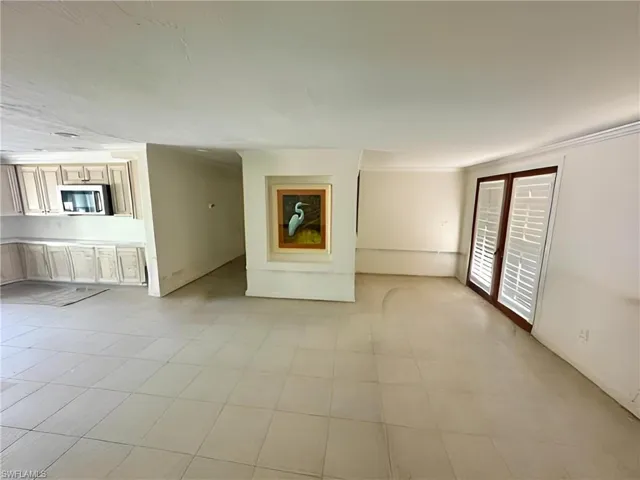 View of unfurnished living room post Milton