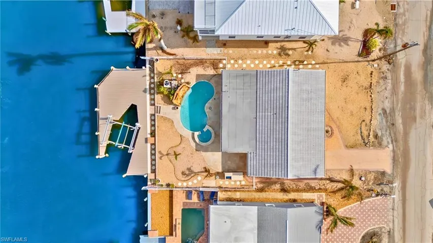 Aerial view with a water view. Image enhanced.