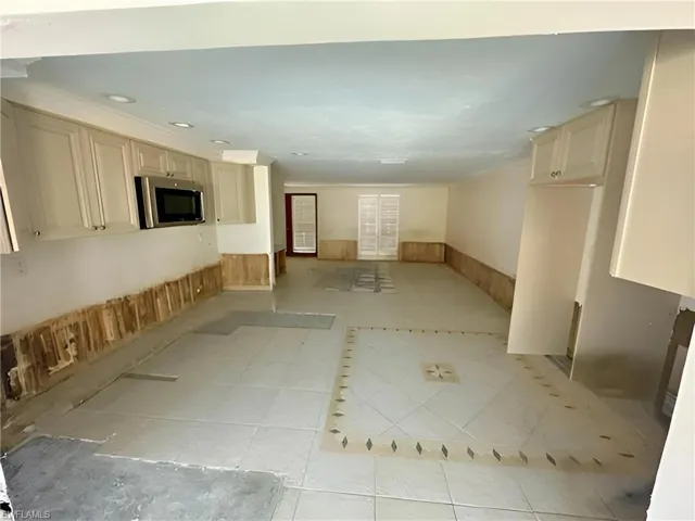 living room and kitchen post Milton