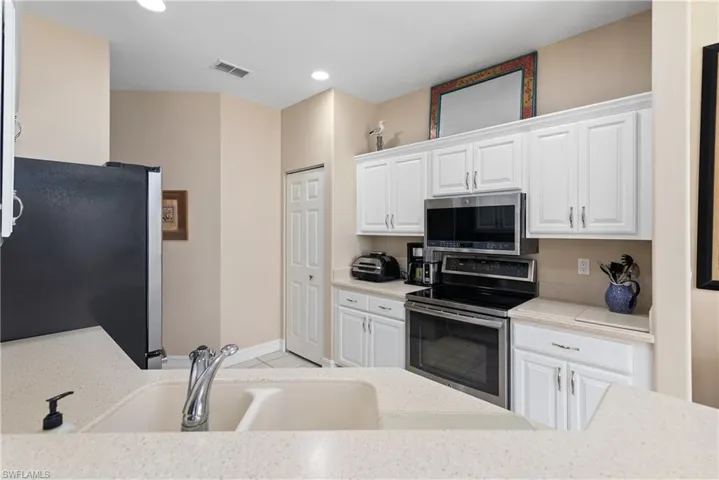 Spacious, with stainless appliances and LOTS of storage