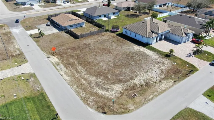 Perfectly situated for BUILDING A CUSTOM HOME, this SPACIOUS PROPERTY measures 95 feet by 124 feet, providing a generous 11,718 sq ft OF LAND TO BRING YOUR VISION TO LIFE INCLUDING THAT OVERSIZED CIRCULAR DRIVEWAY!