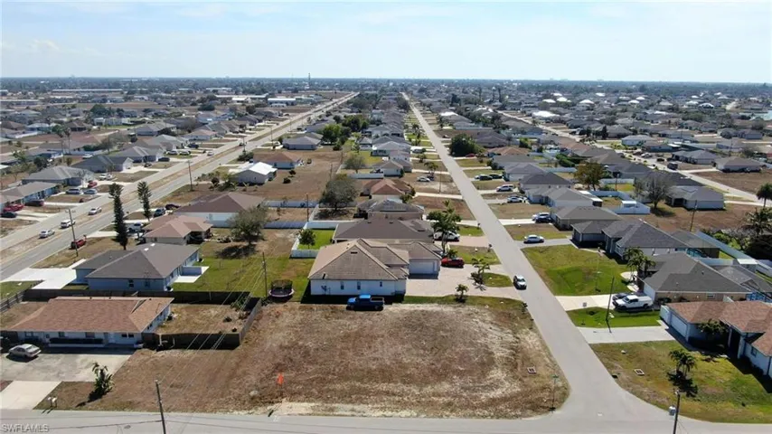 Located in ZONE D - 4th evacuation zone – this property DOES NOT REQUIRE FLOOD INSURANCE! The lot is CLEARED, OVERSIZED, RECTANGULAR and READY FOR CONSTRUCTION with CITY WATER and SEWER: design a home with plenty of room for both INDOOR and OUTDOOR LIVING!