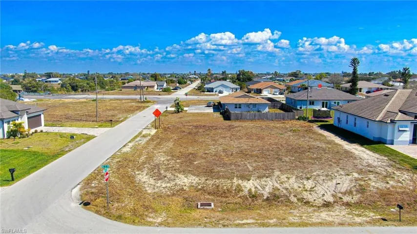 *PHENOMENAL OPPORTUNITY TO BUILD YOUR DREAM HOME IN OVERSIZED CORNER LOT in CAPE CORAL SWFL PARADISE!* This 0.269-acre VACANT RESIDENTIAL LOT in NE CAPE CORAL (NORTH 2) offers an EXCEPTIONAL OPPORTUNITY TO CREATE YOUR IDEAL LIVING SPACE!
