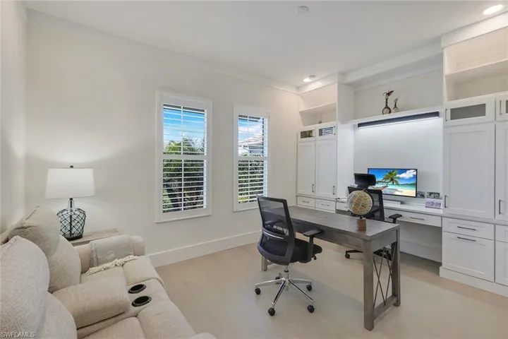Home office featuring light hardwood / wood-style flooring
