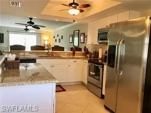 Indoor bar featuring wine cooler