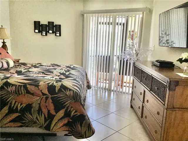 Large lanai overlooking golf course and lake view