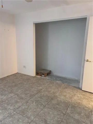 Spare room featuring ceiling fan