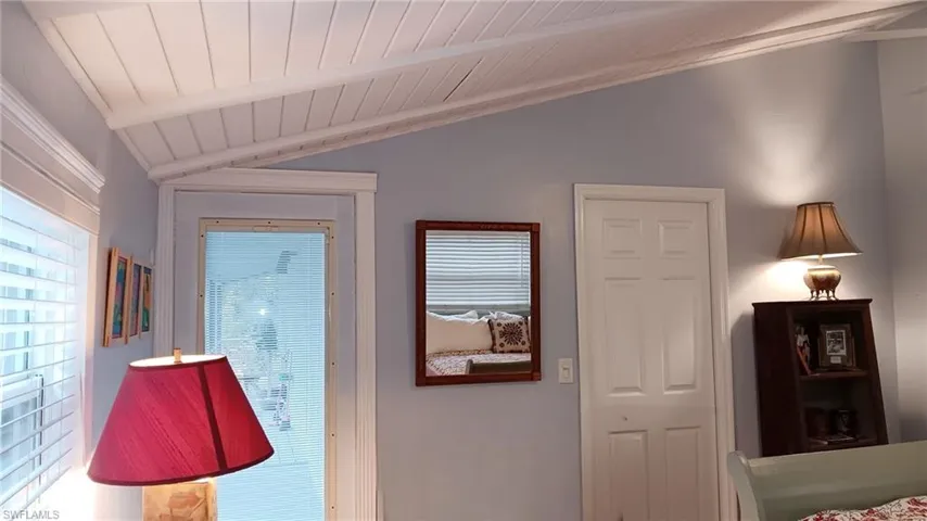 Upstairs, with bathroom door shut, glass door to screened balcony#3