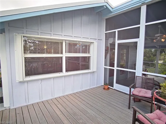 Balcony #1 of stilt home, connects to the kitchen porch, entertaining views of the pond life