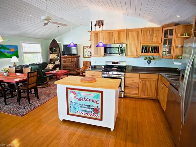 Upstairs Kitchen, gas range, stainless appliances, cathedral ceilings, bamboo floors