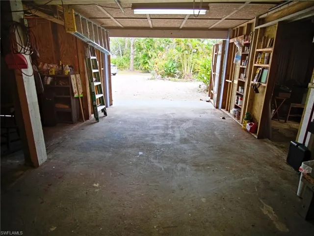 The garage has the main door then 2 rooms with doors, ideal for motorcycles