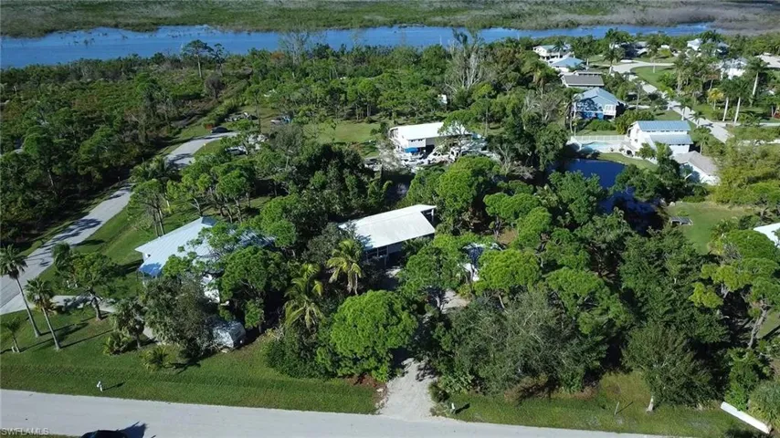 View of "The Nestings" Subdivision, community pool behind the house across the street