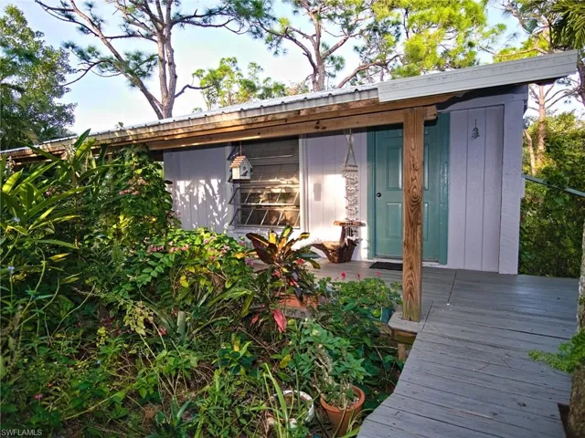 Cottage Entrance surrounded by flowers