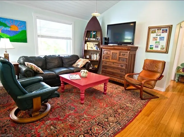 Living room: big windows, recessed lighting
