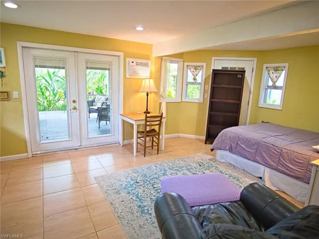 Downstairs:French doors, 3 windows, ceramic floors, recessed lights