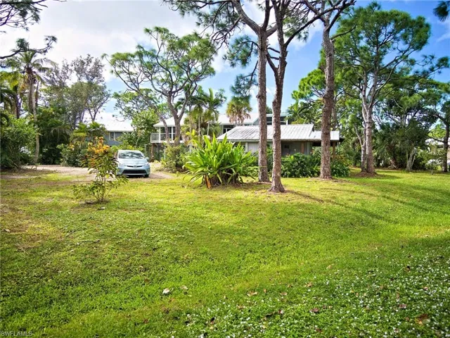 Front corner shows a fraction of the sprawling property