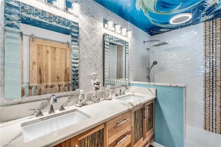 Bathroom with vanity and walk in shower