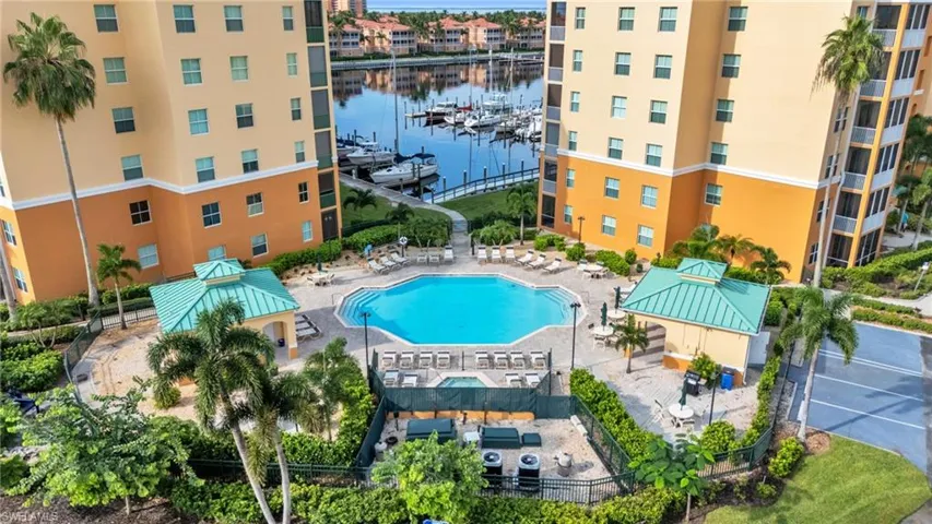 View of swimming pool with a water view