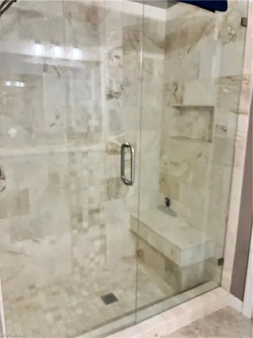 Full bathroom with a stall shower