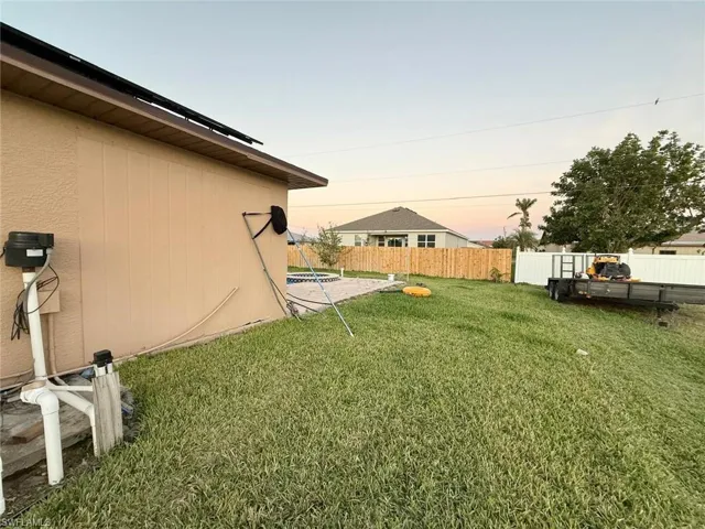 View of yard at dusk