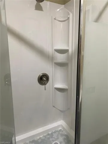 Bathroom featuring walk in shower