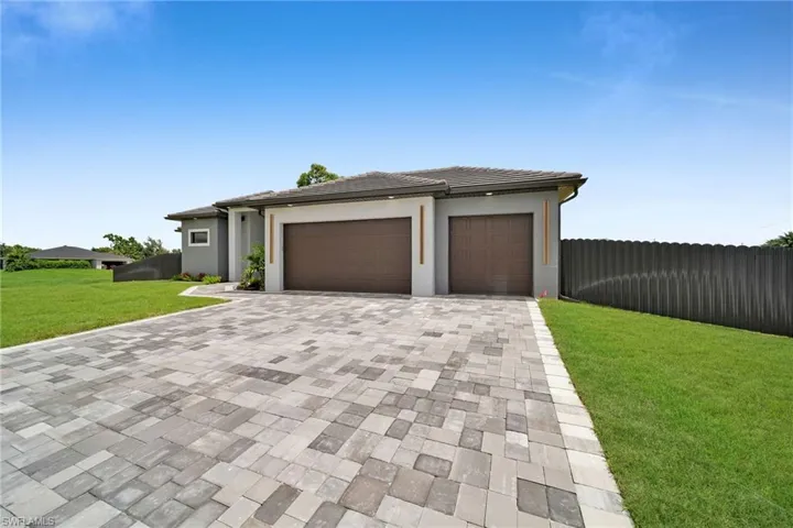 View of front of home featuring a front lawn