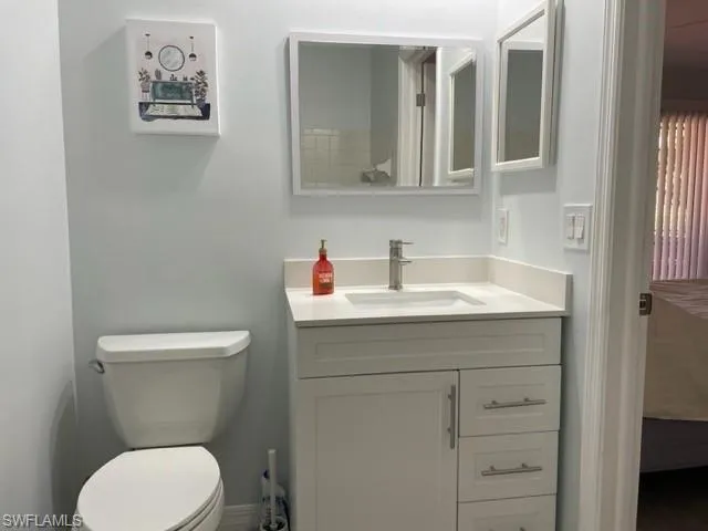 Bathroom with toilet and vanity