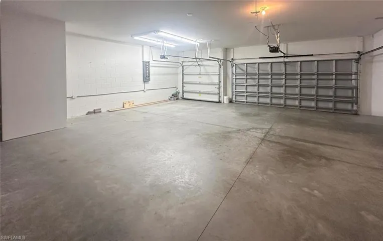 Garage featuring electric panel