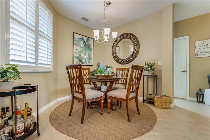 Formal Dining area at entry. View of 1st floor half bathroom