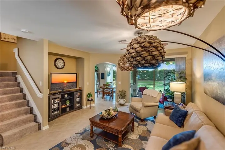 Large living space with slider providing lots of natural light