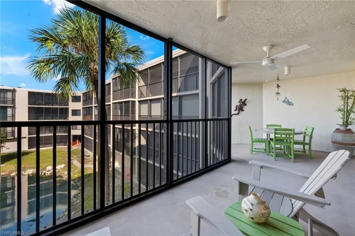 Balcony featuring ceiling fan
