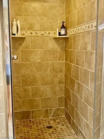 Bathroom with tiled shower