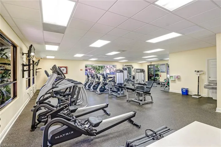 Exercise room featuring a drop ceiling