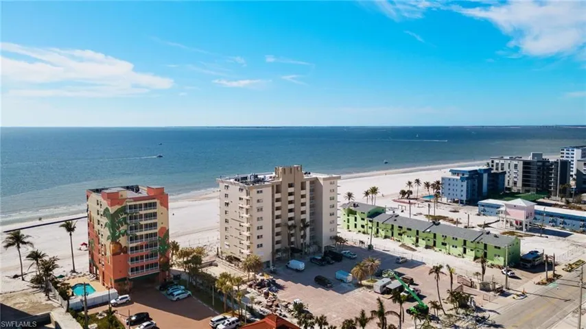 Drone / aerial view featuring a water view and a beach view