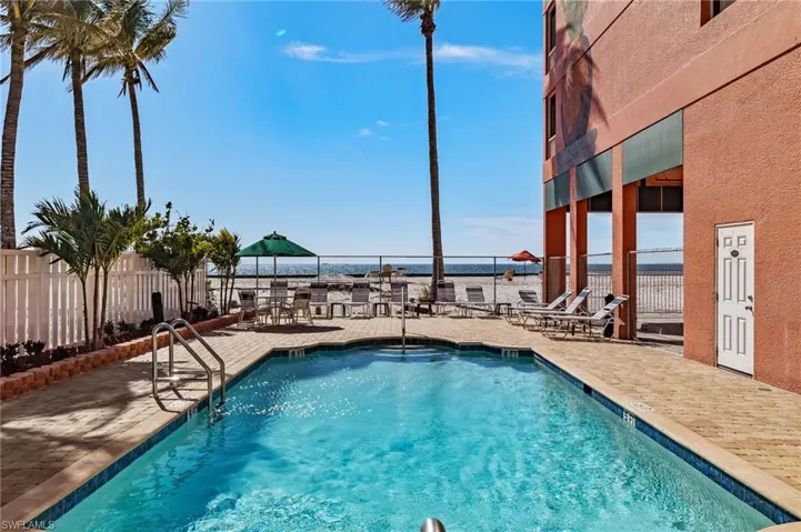 View of swimming pool with a patio area