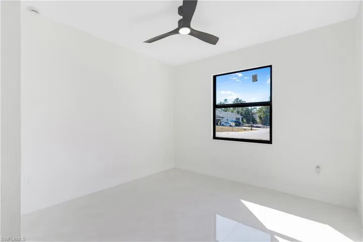 Spare room featuring ceiling fan