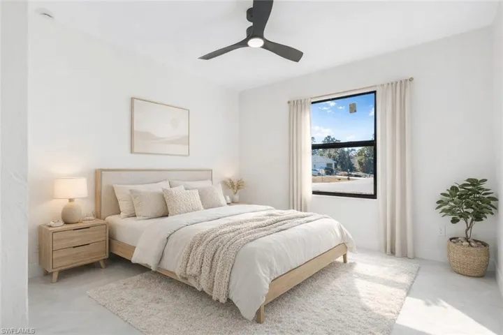 Virtually Staged Bedroom featuring ceiling fan